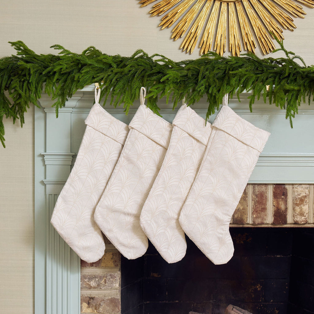 white embroidered stocking with arched design