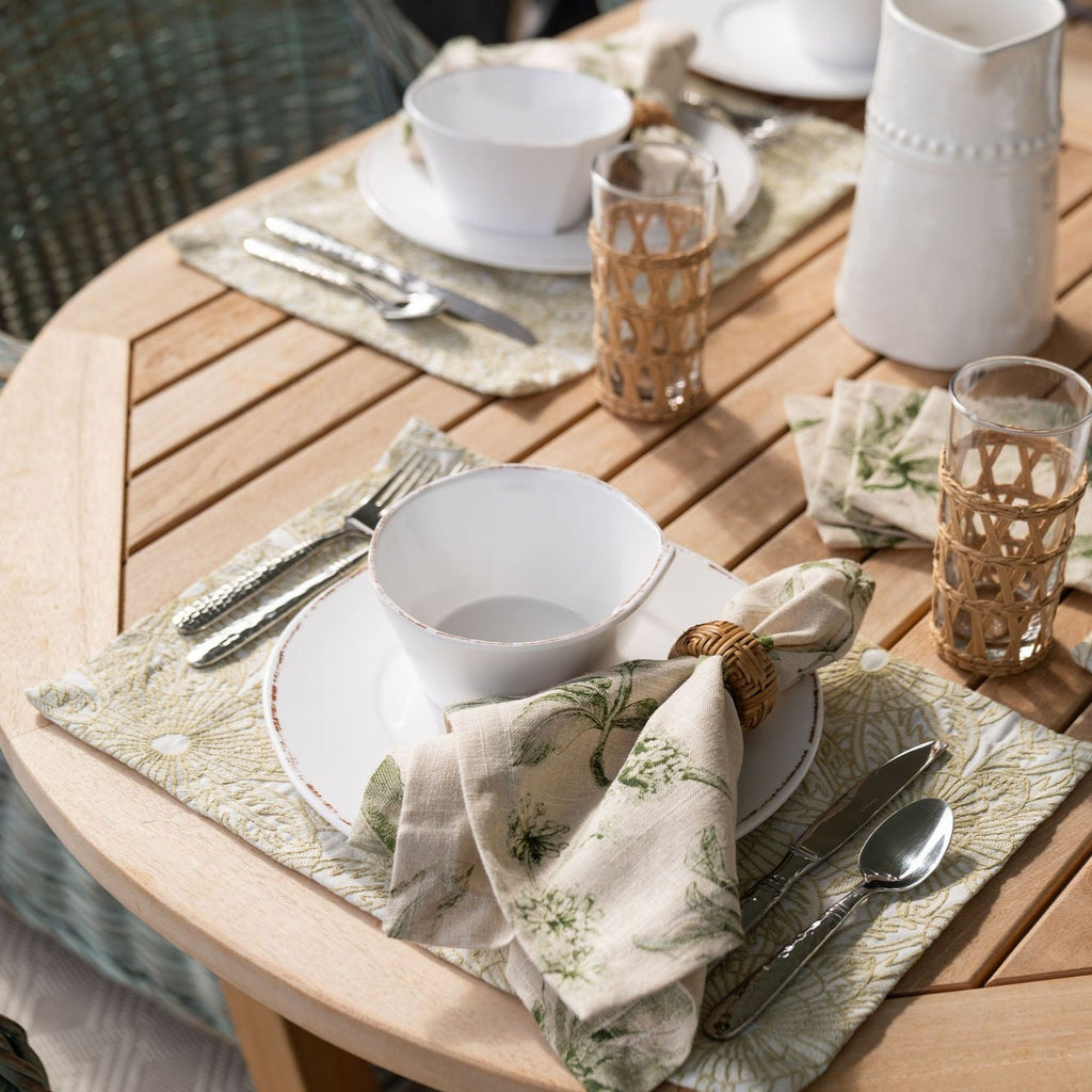 Cumberland Moss Placemats Displayed with Flora Basil Dinner Napkins and Cocktail Napkins on Outdoor Table