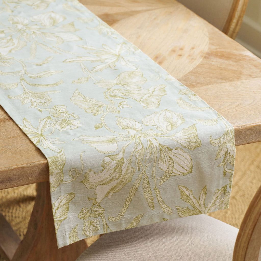 green and blue floral patterned table runner 