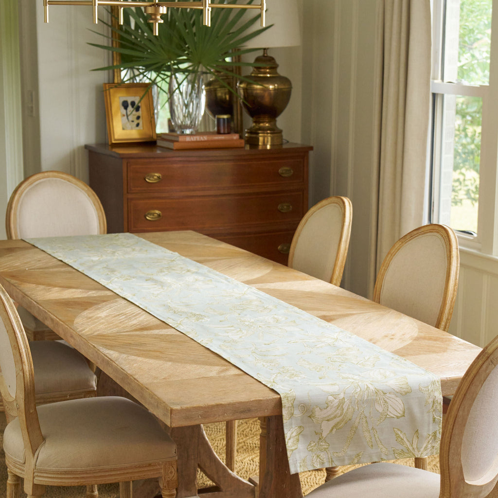 green and blue floral patterned table runner 