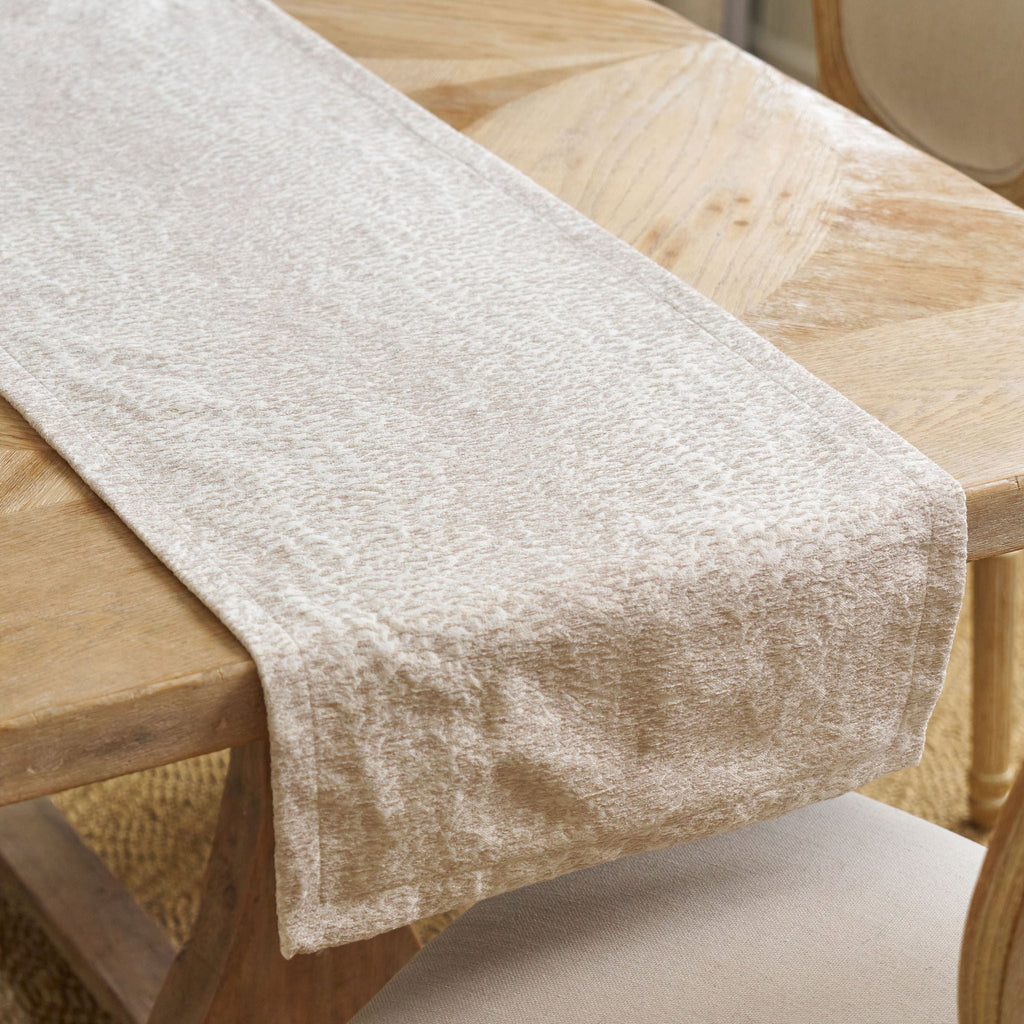 tan patterned table runner
