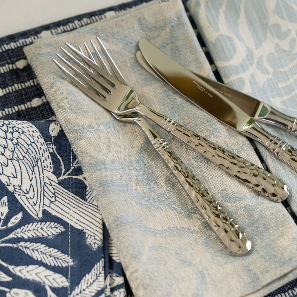 Ridley Sky Dinner Napkin Displayed with Ellis Indigo and Lockwood Mineral Dinner Napkins and Smith Marina Placemat