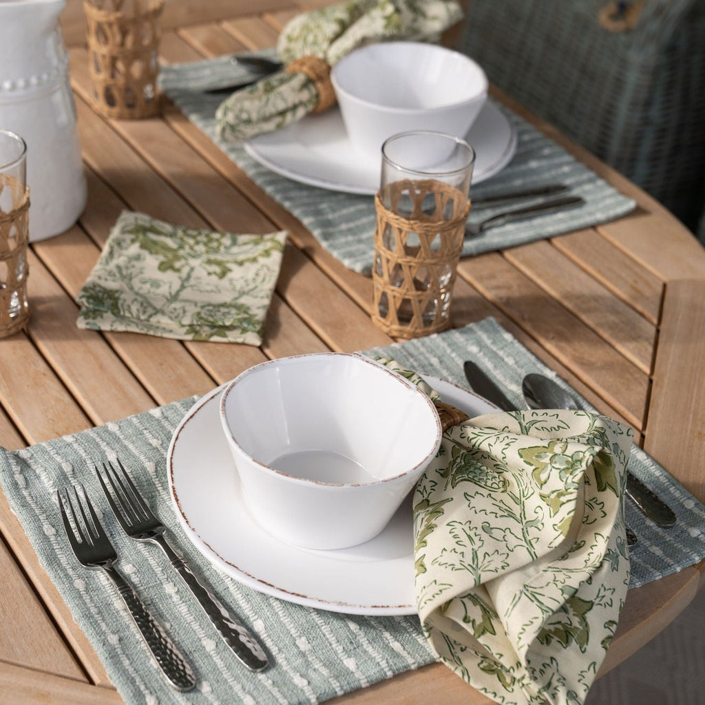Smith Lagoon Placemat Displayed with Hampton Parrot Dinner Napkin on Outdoor Table