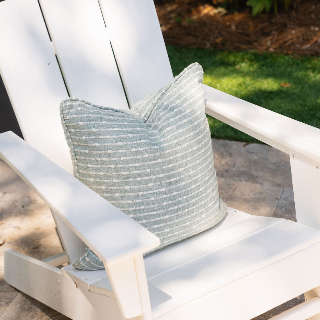 sage and white embroidered outdoor throw pillow