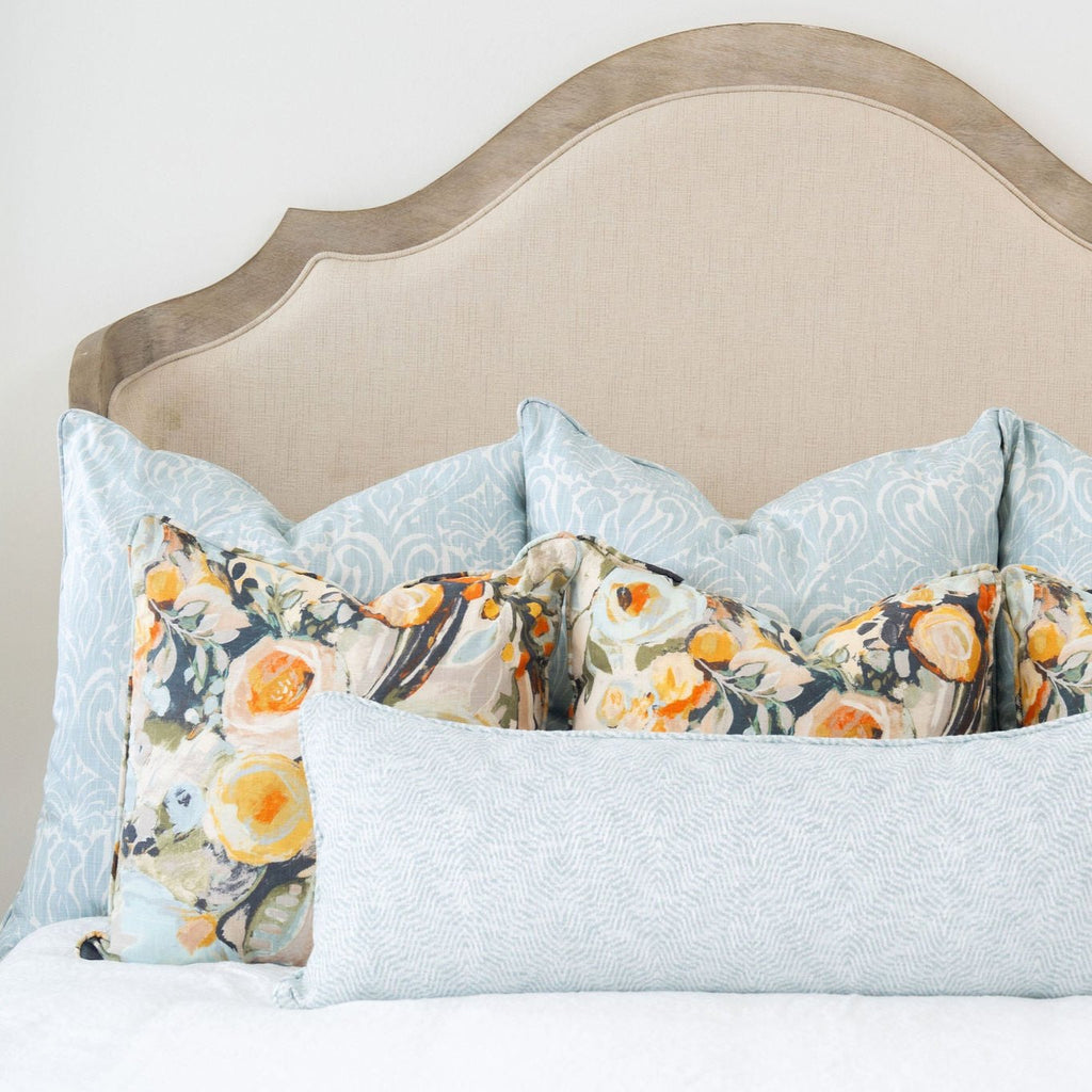 colorful foral and blue pillows