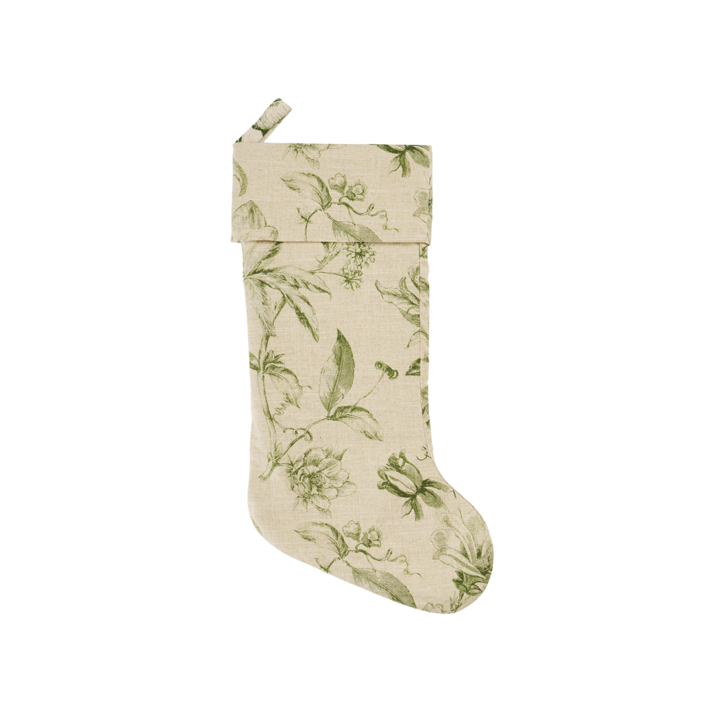 Christmas stocking with green leaf pattern on a white background