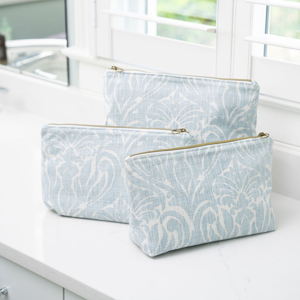 blue and white patterned cosmetic bag