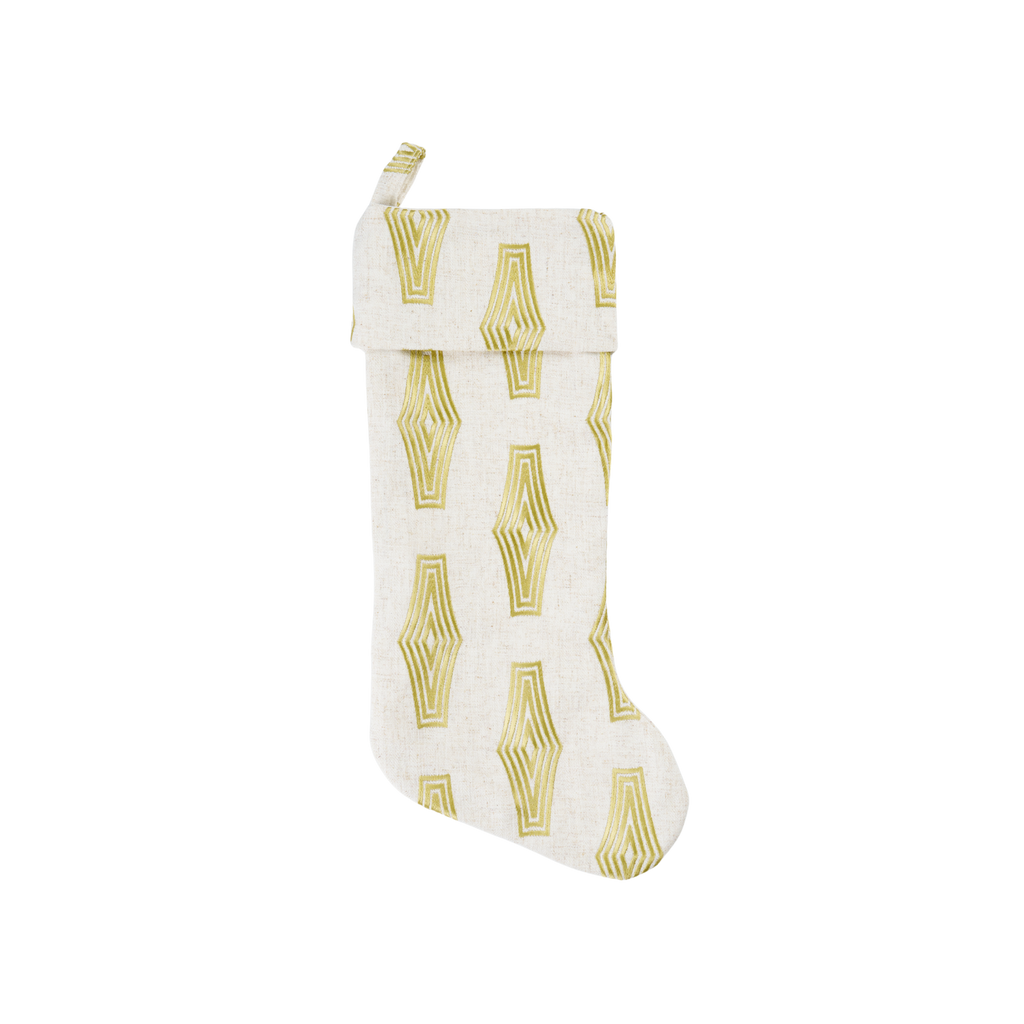 White Christmas stocking with yellow geometric pattern on a white background